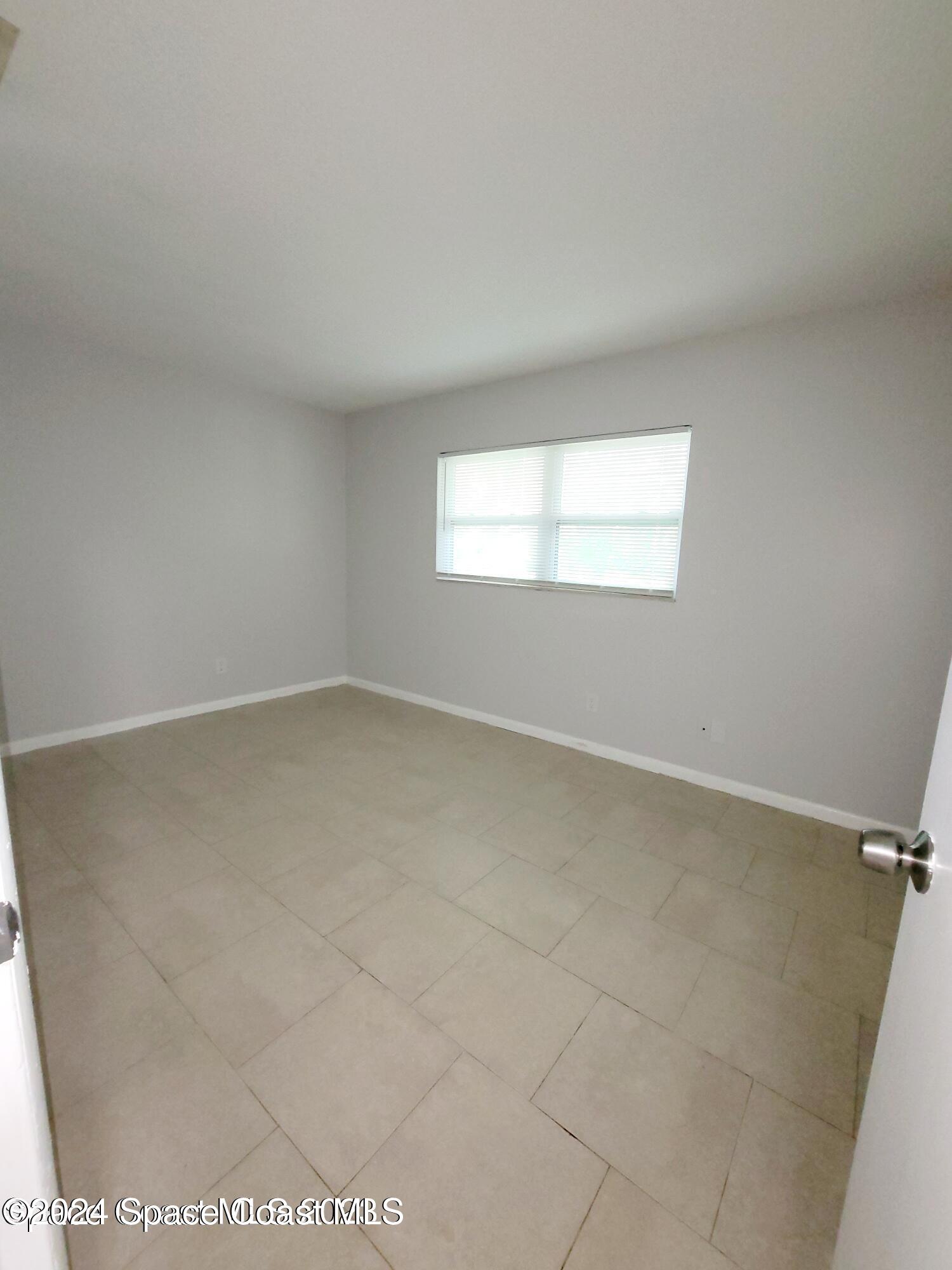 419 Audubon Drive, Unit B Melbourne, FL 32901 - Photo 10 of 11 Bedroom 2