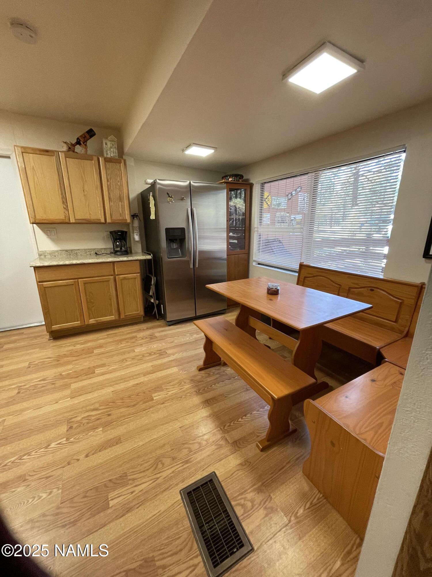 7681 East Robin Hood Road Williams, AZ 86046 - Photo 11 of 17 a room with wooden floor and pool table