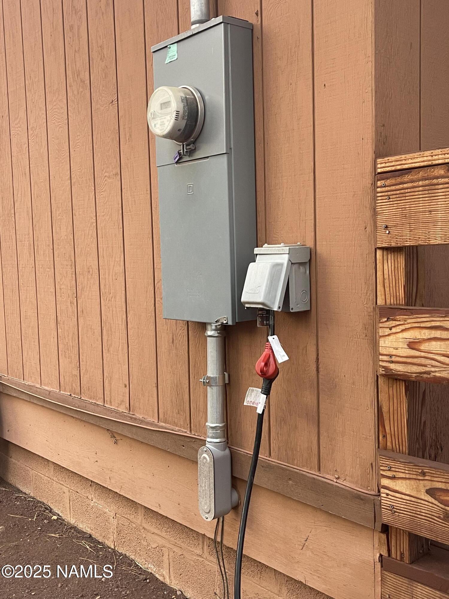 7681 East Robin Hood Road Williams, AZ 86046 - Photo 16 of 17 a view of entryway and hall with wooden floor