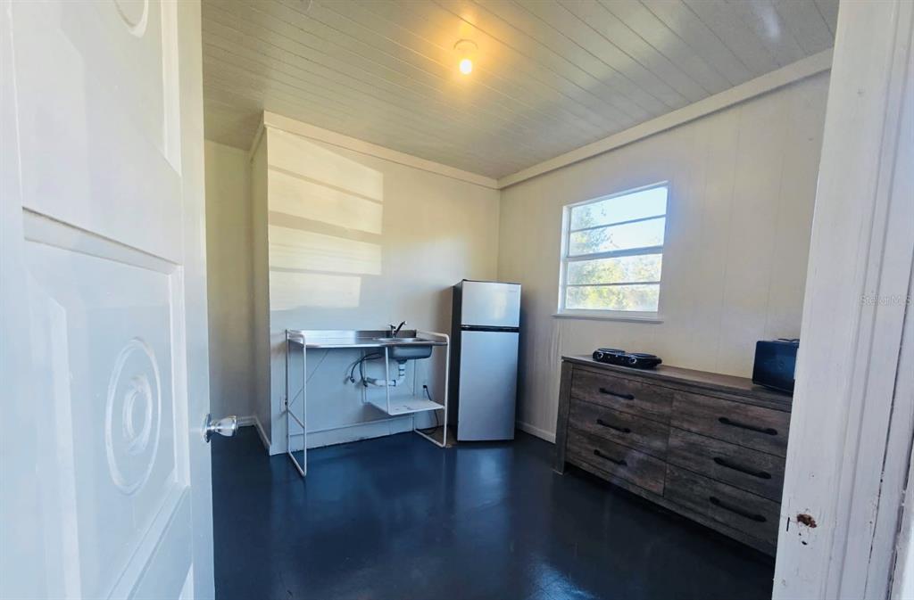 8010 Southeast Us Highway, Unit 5B Hawthorne, FL 32640 - Photo 3 of 7 a view of livingroom with furniture and wooden floor