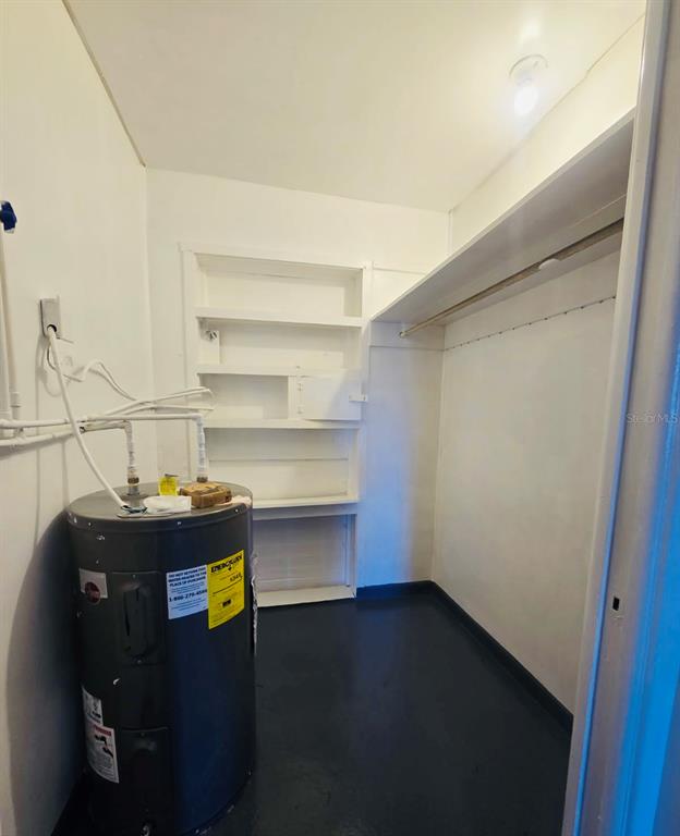 8010 Southeast Us Highway, Unit 5B Hawthorne, FL 32640 - Photo 6 of 7 a room with storage and utility