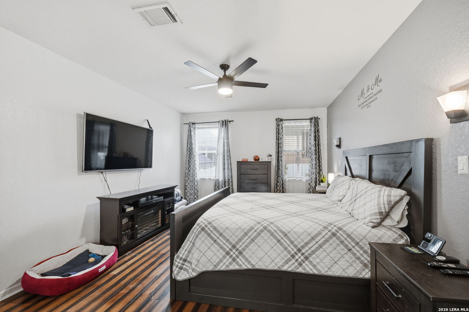 516 Brook Shadow Cibolo, TX 78108 - Photo 21 of 39 a bedroom with a bed and a flat screen tv