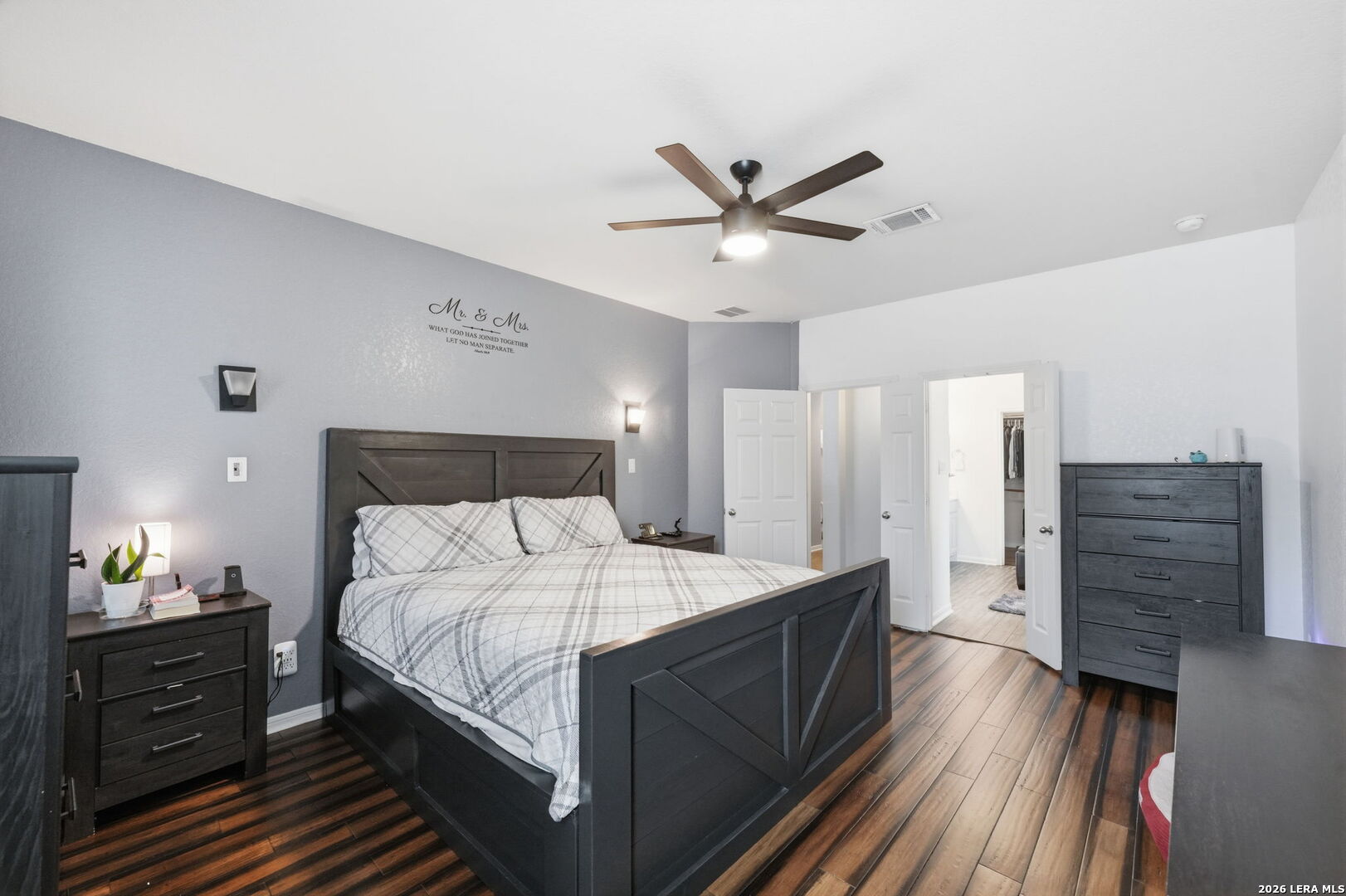 516 Brook Shadow Cibolo, TX 78108 - Photo 22 of 39 a bedroom with bed and wooden floor