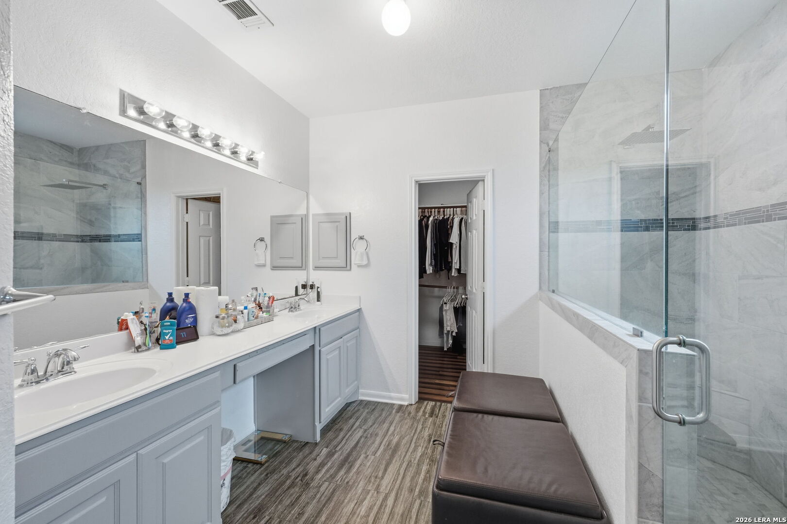 516 Brook Shadow Cibolo, TX 78108 - Photo 23 of 39 a bathroom with a sink mirror and a shower