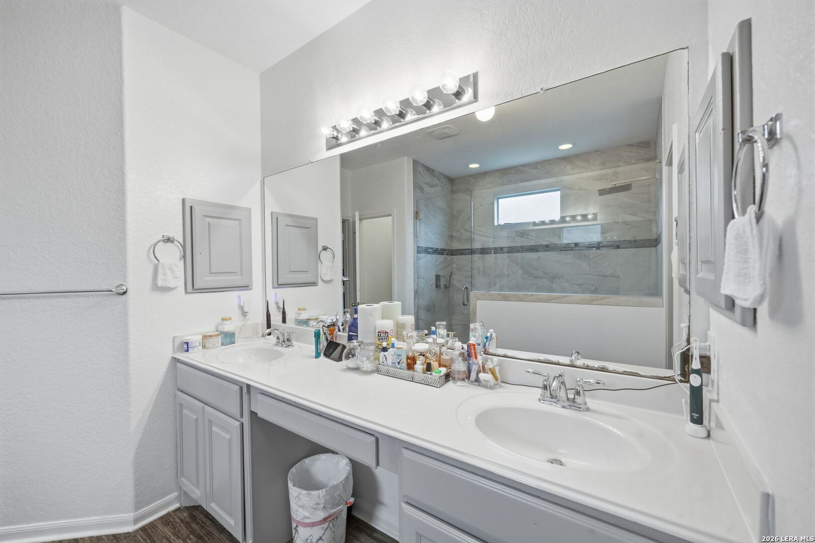 516 Brook Shadow Cibolo, TX 78108 - Photo 26 of 39 a bathroom with a double vanity sink mirror and double
