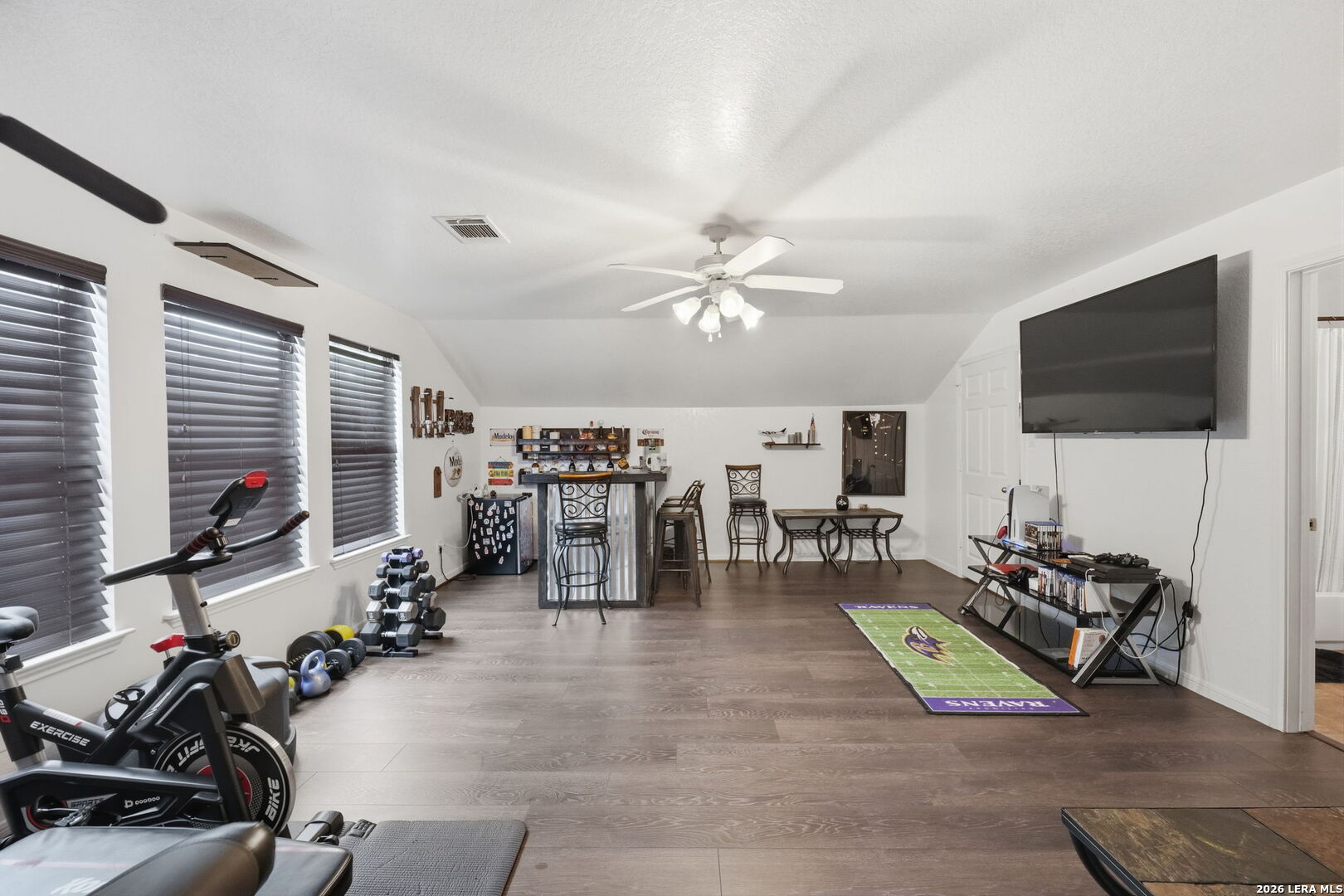 516 Brook Shadow Cibolo, TX 78108 - Photo 27 of 39 a view of a livingroom with furniture and a flat screen tv