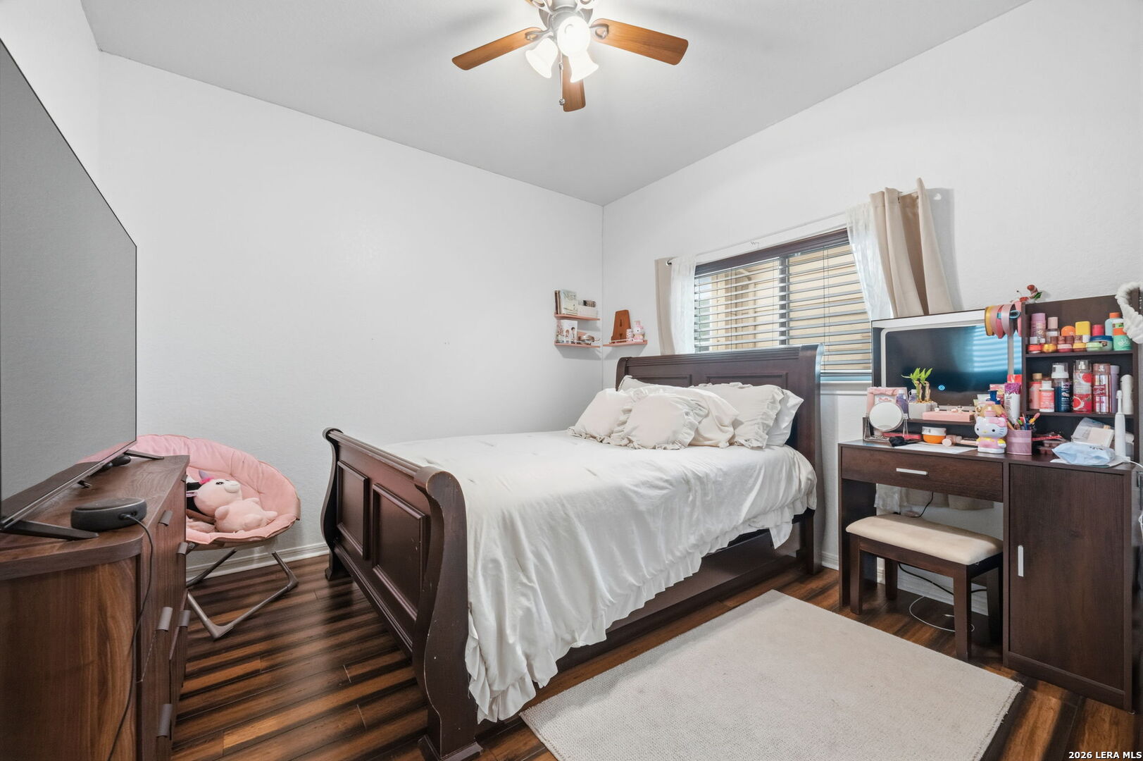 516 Brook Shadow Cibolo, TX 78108 - Photo 33 of 39 a bedroom with a bed and a chandelier