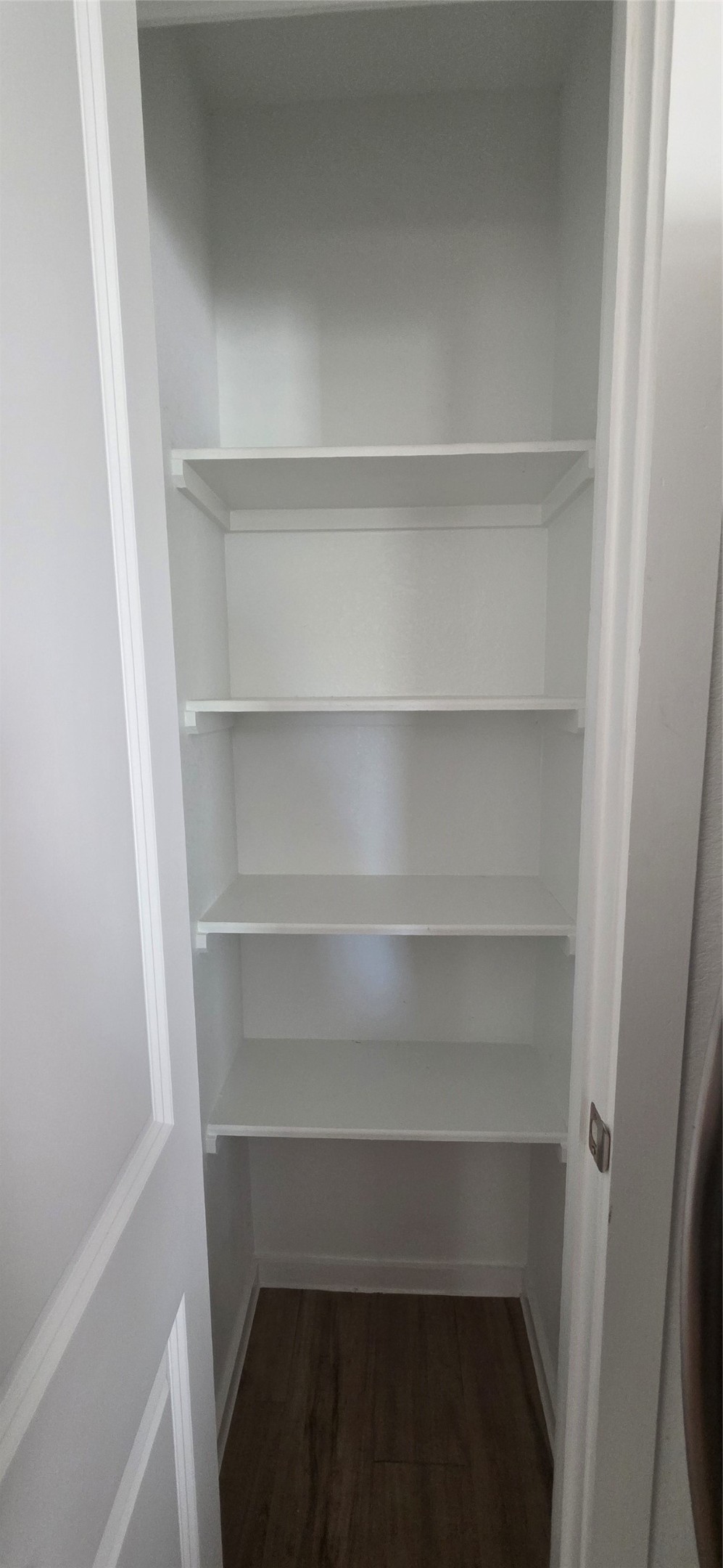 2410 Ridge Oak Drive Conroe, TX 77301 - Photo 22 of 31 a view of walk in closet with empty racks