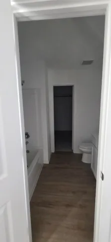 a view of a backyard with jacuzzi