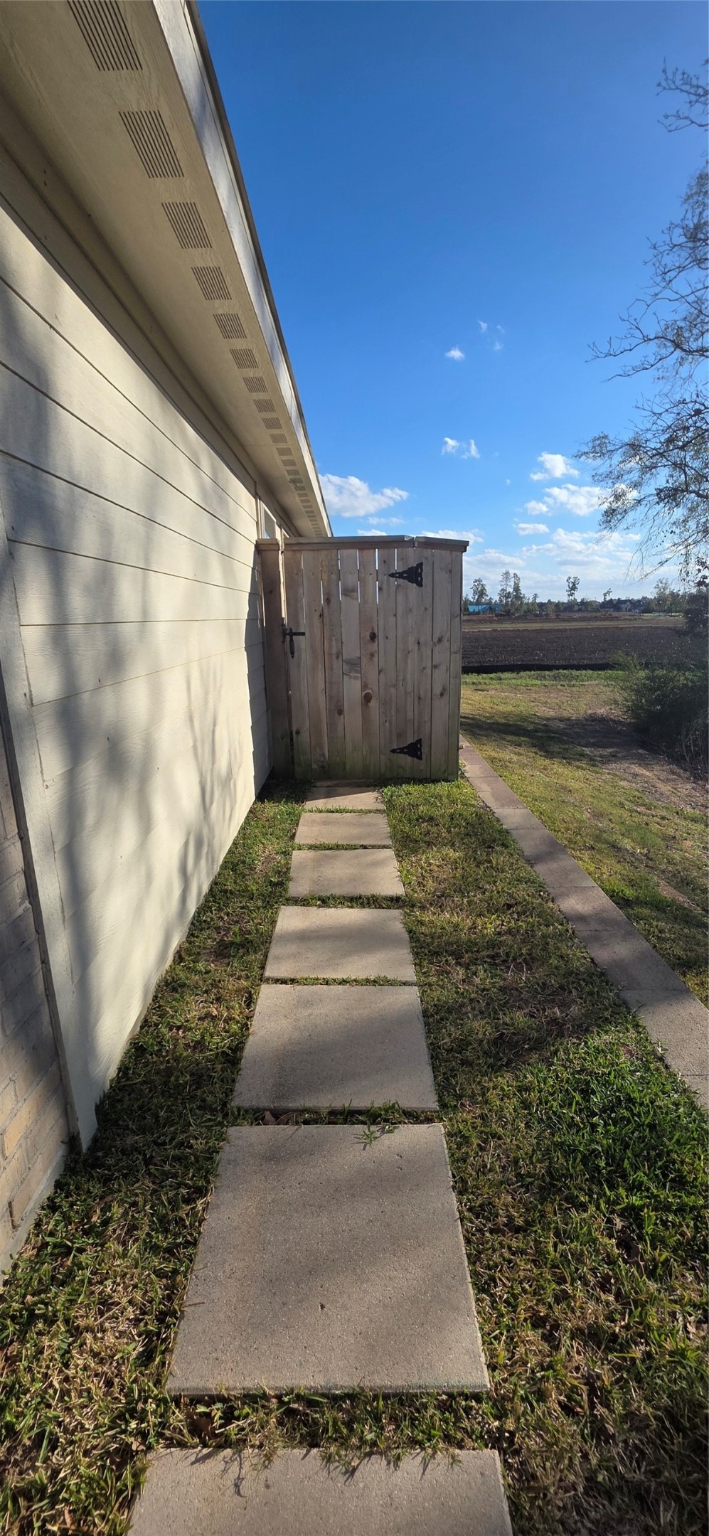 2410 Ridge Oak Drive Conroe, TX 77301 - Photo 29 of 31 a view of a backyard with wooden floor