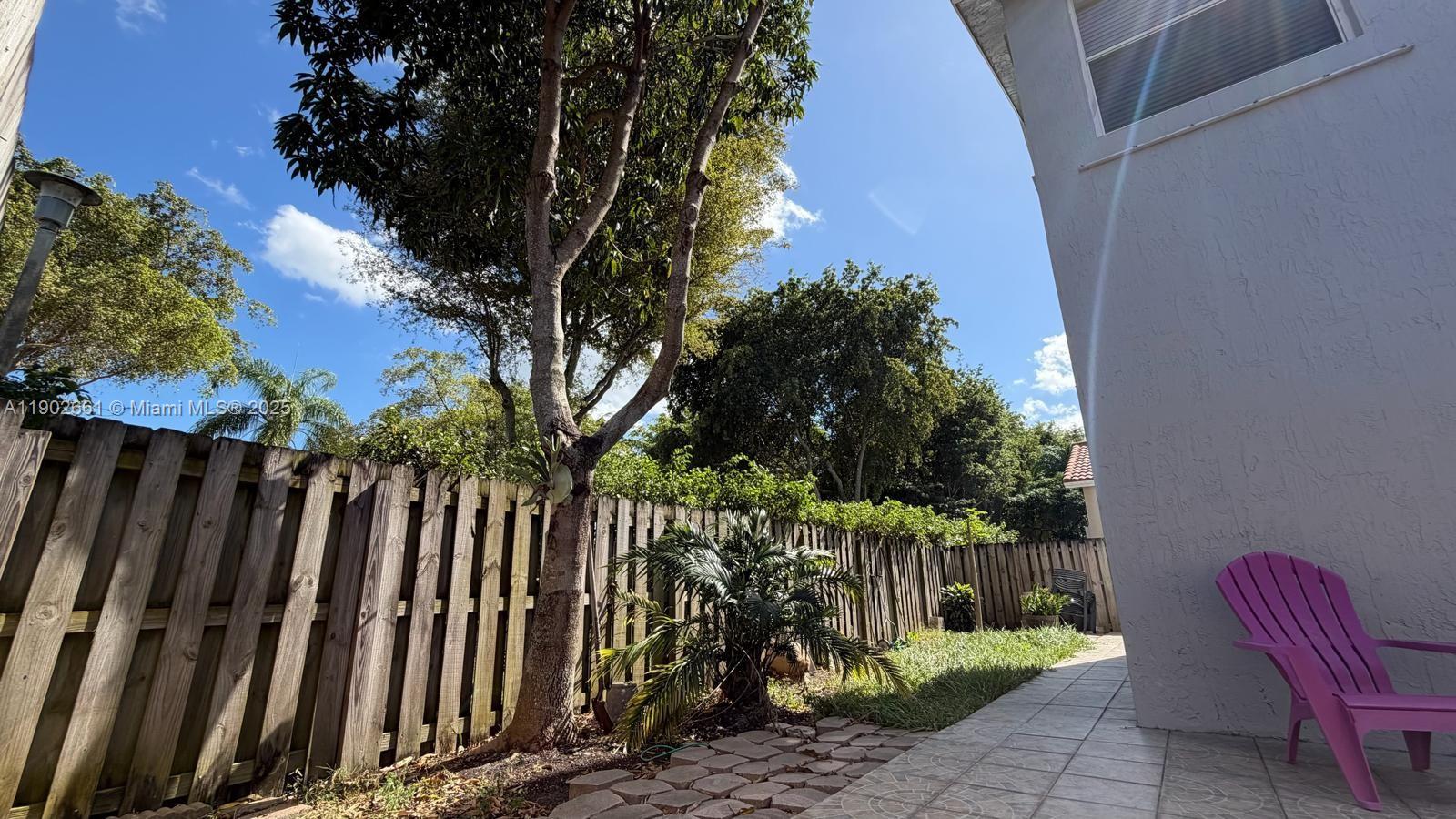 14713 Southwest 155th Place Miami, FL 33196 - Photo 19 of 23 a view of outdoor space with seating area