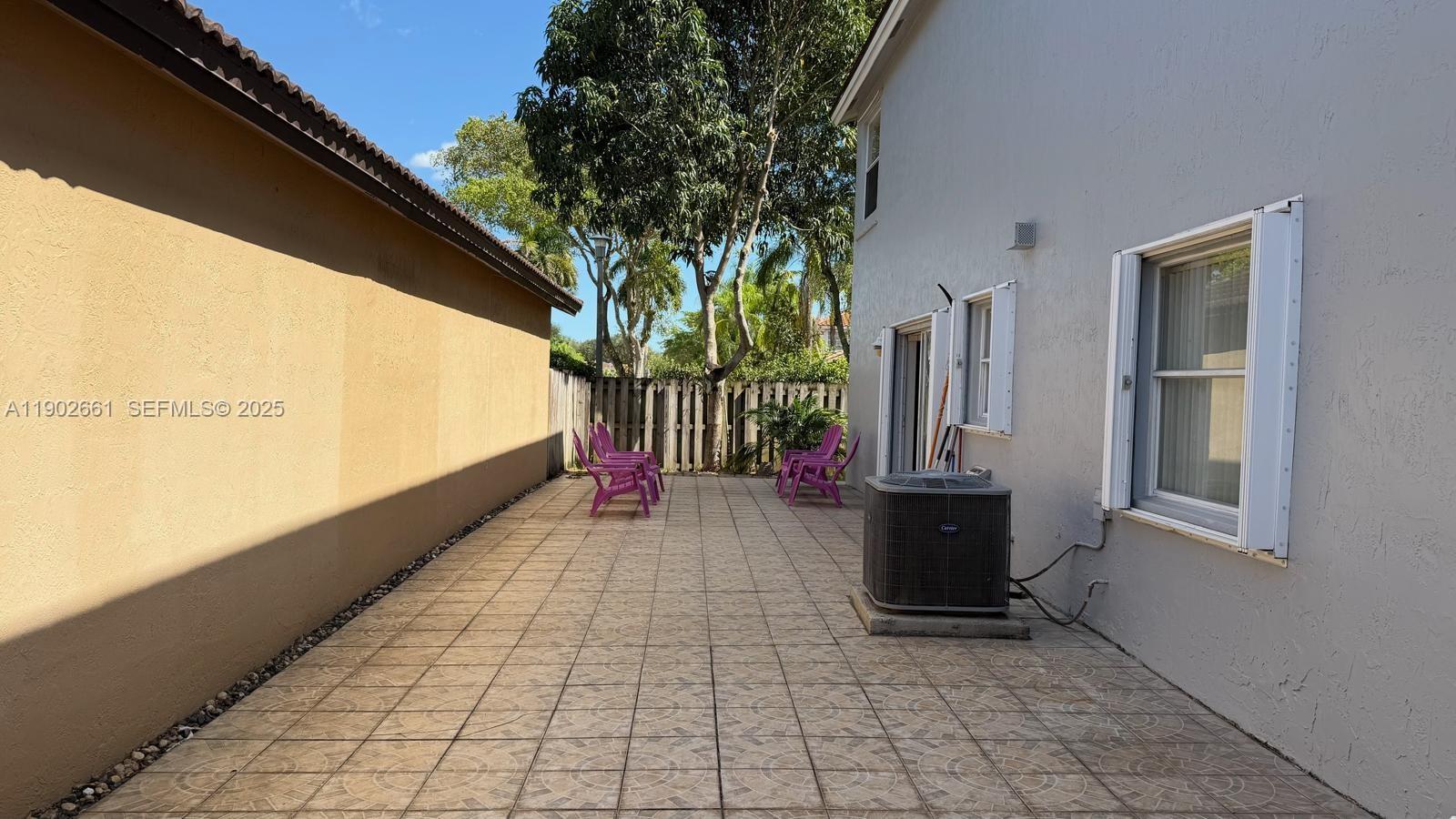14713 Southwest 155th Place Miami, FL 33196 - Photo 21 of 23 a view of a porch with furniture