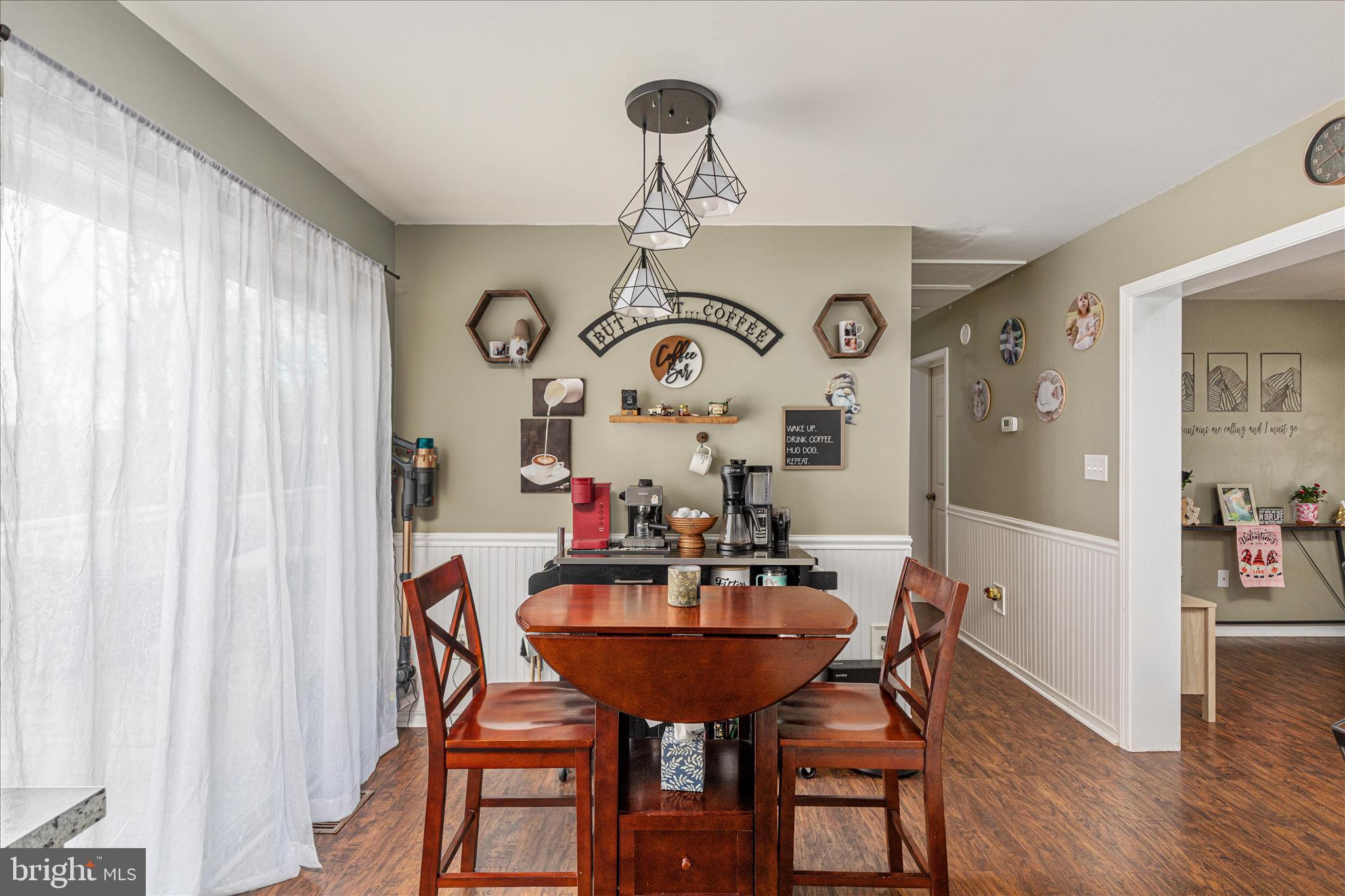 67 Pocahontas Road Front Royal, VA 22630 - Photo 12 of 49 a view of a dining room with furniture and wooden floor