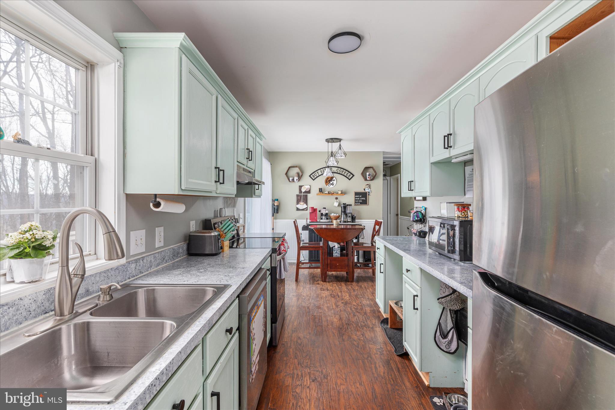 67 Pocahontas Road Front Royal, VA 22630 - Photo 15 of 49 a kitchen that has a sink cabinets and window