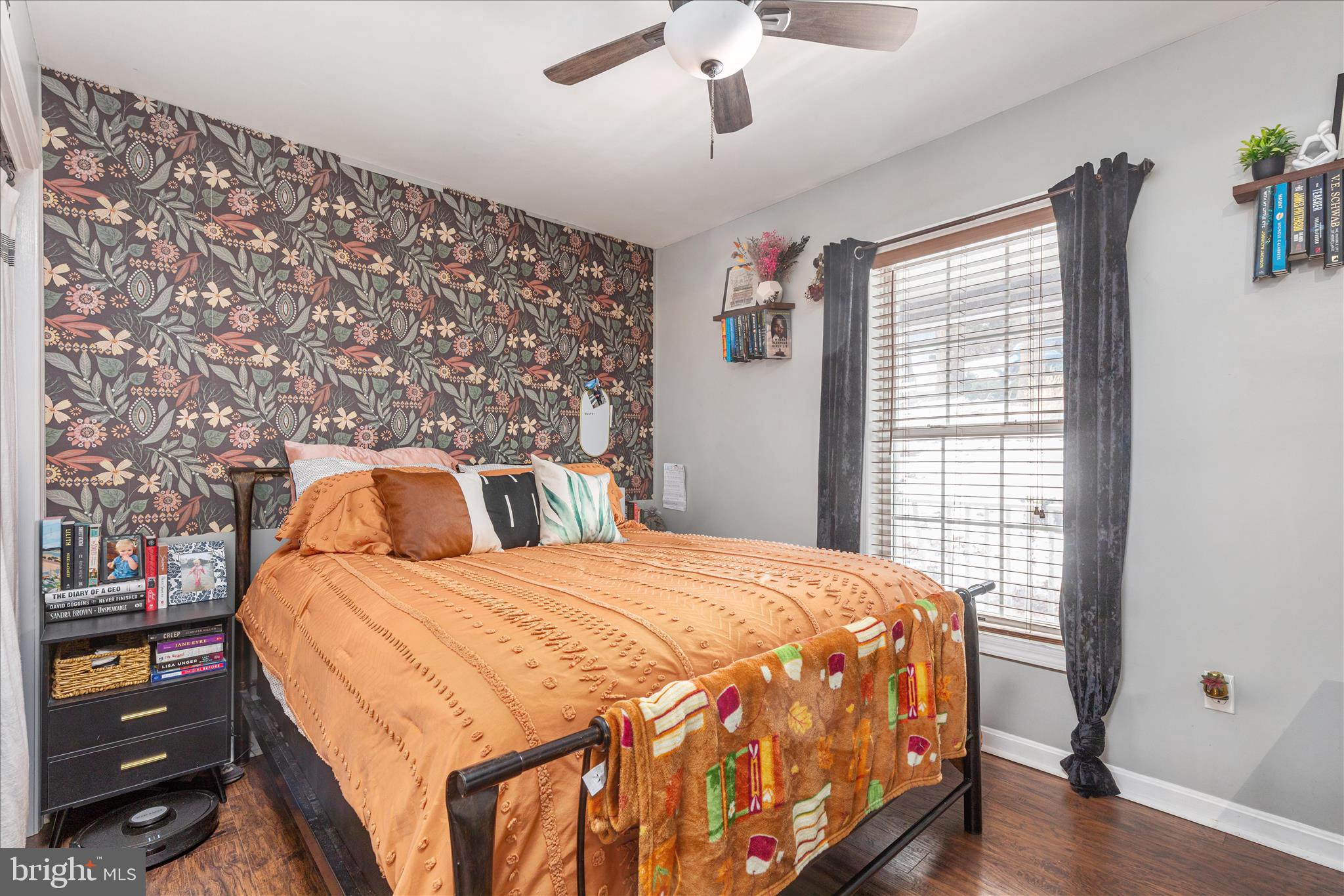 67 Pocahontas Road Front Royal, VA 22630 - Photo 18 of 49 a bedroom with a bed and a chandelier