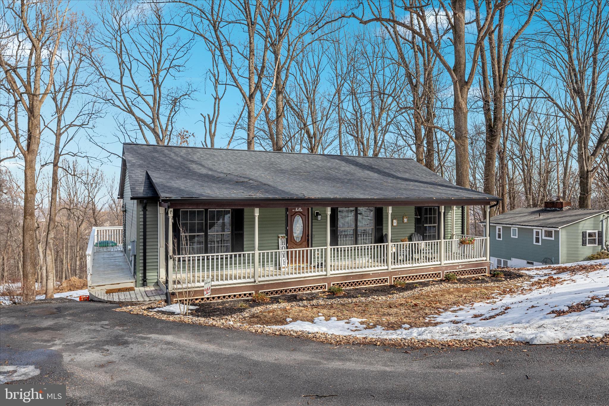 67 Pocahontas Road Front Royal, VA 22630 - Photo 2 of 49 a front view of a house with a garden