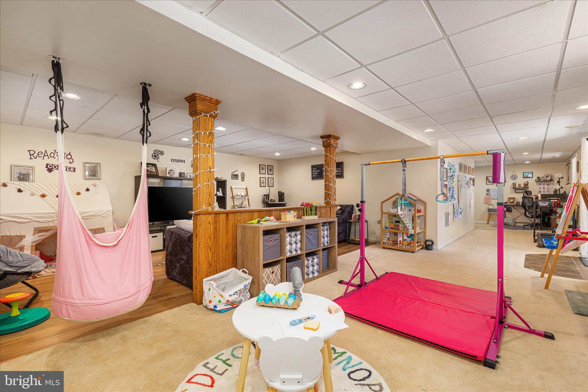 67 Pocahontas Road Front Royal, VA 22630 - Photo 28 of 49 a living room with furniture gym equipment and kitchen view
