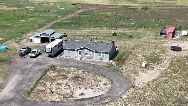 $560,000 | 11809 Pass Me By Road, Strasburg, CO 80136