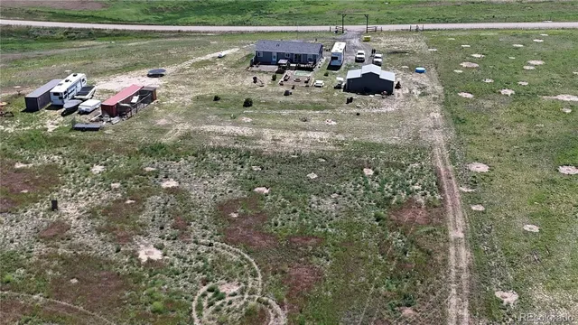 $560,000 | 11809 Pass Me By Road, Strasburg, CO 80136