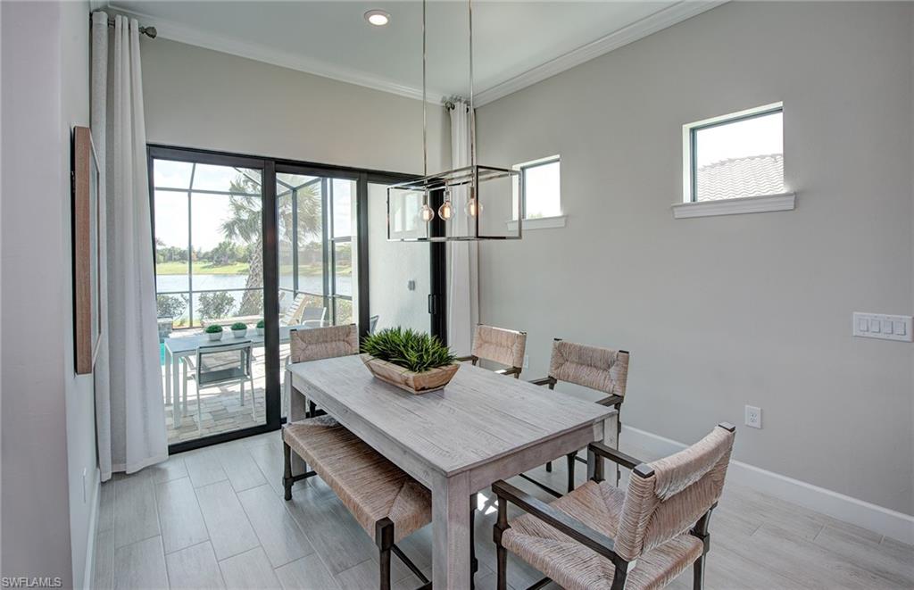 2126 Yellowfin Circle Naples, FL 34114 - Photo 15 of 29 a view of a livingroom with furniture and window