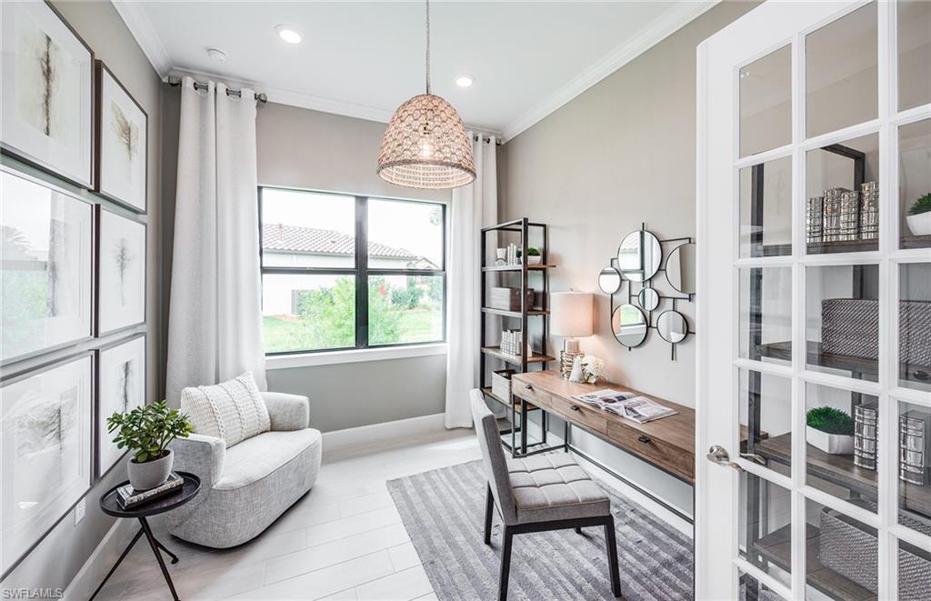 2126 Yellowfin Circle Naples, FL 34114 - Photo 8 of 29 a living room with furniture and a large window