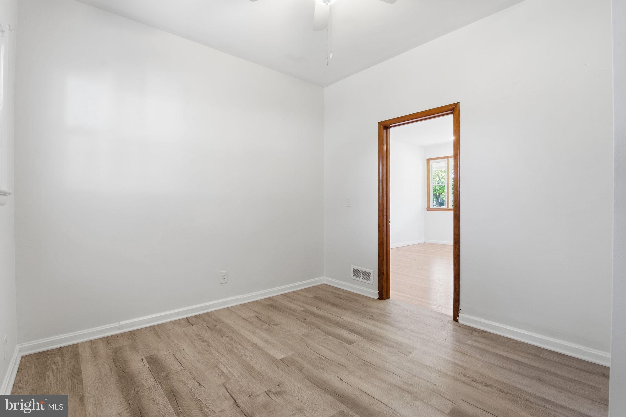 2301 Bayside Drive Baltimore, MD 21221 - Photo 23 of 35 wooden floor in an empty room