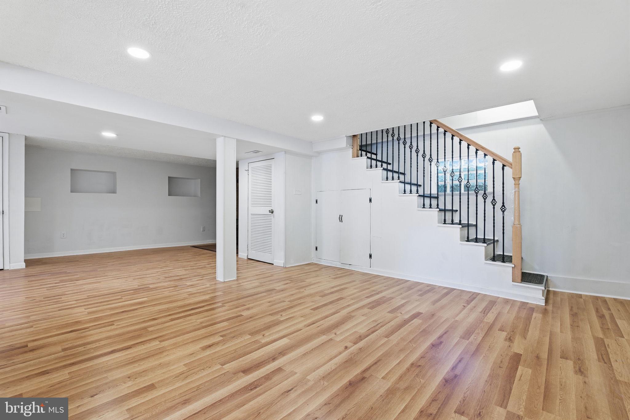 2301 Bayside Drive Baltimore, MD 21221 - Photo 27 of 35 a view of an empty room with wooden floor