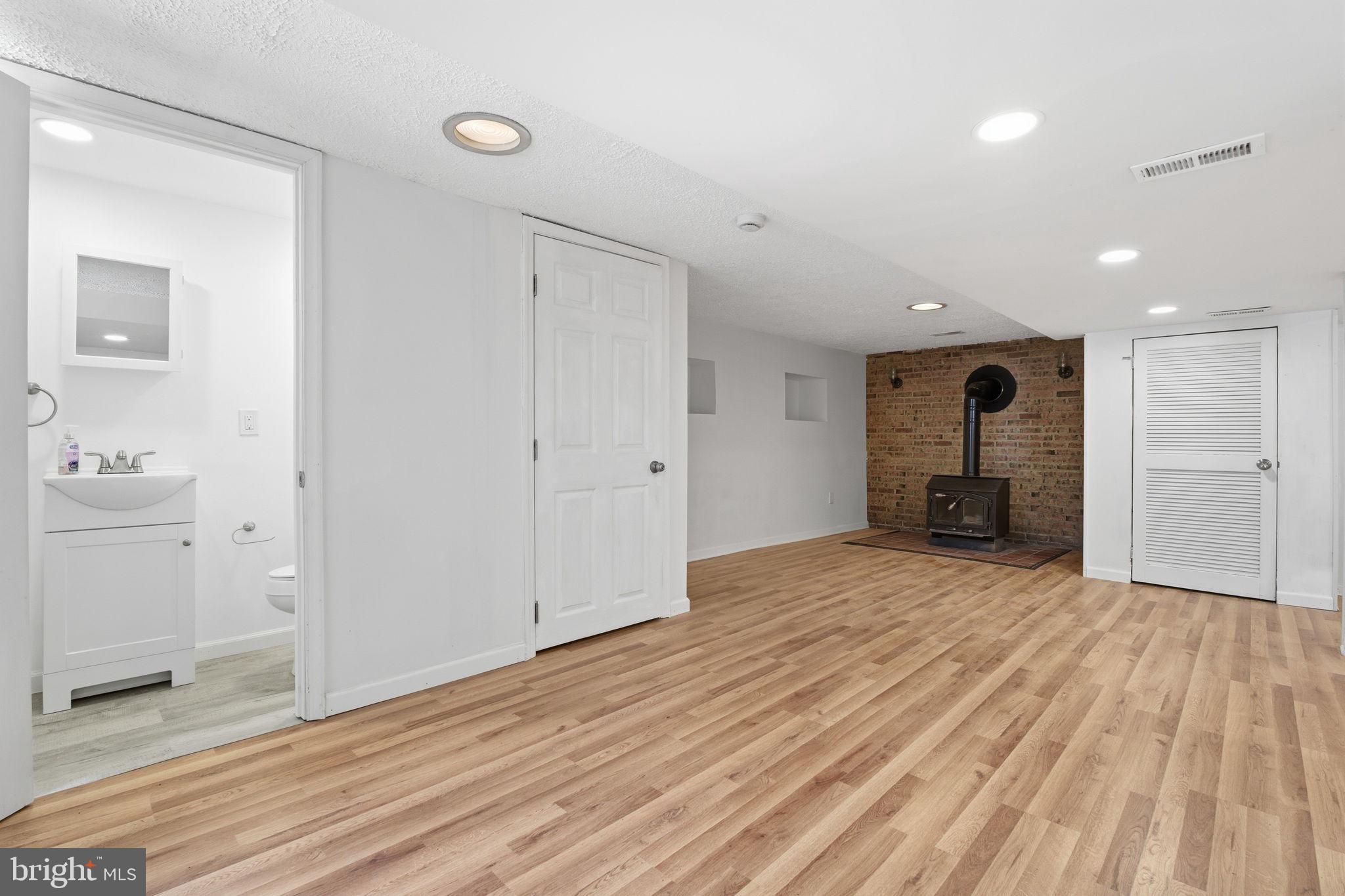 2301 Bayside Drive Baltimore, MD 21221 - Photo 29 of 35 a view of empty room with wooden floor and fan