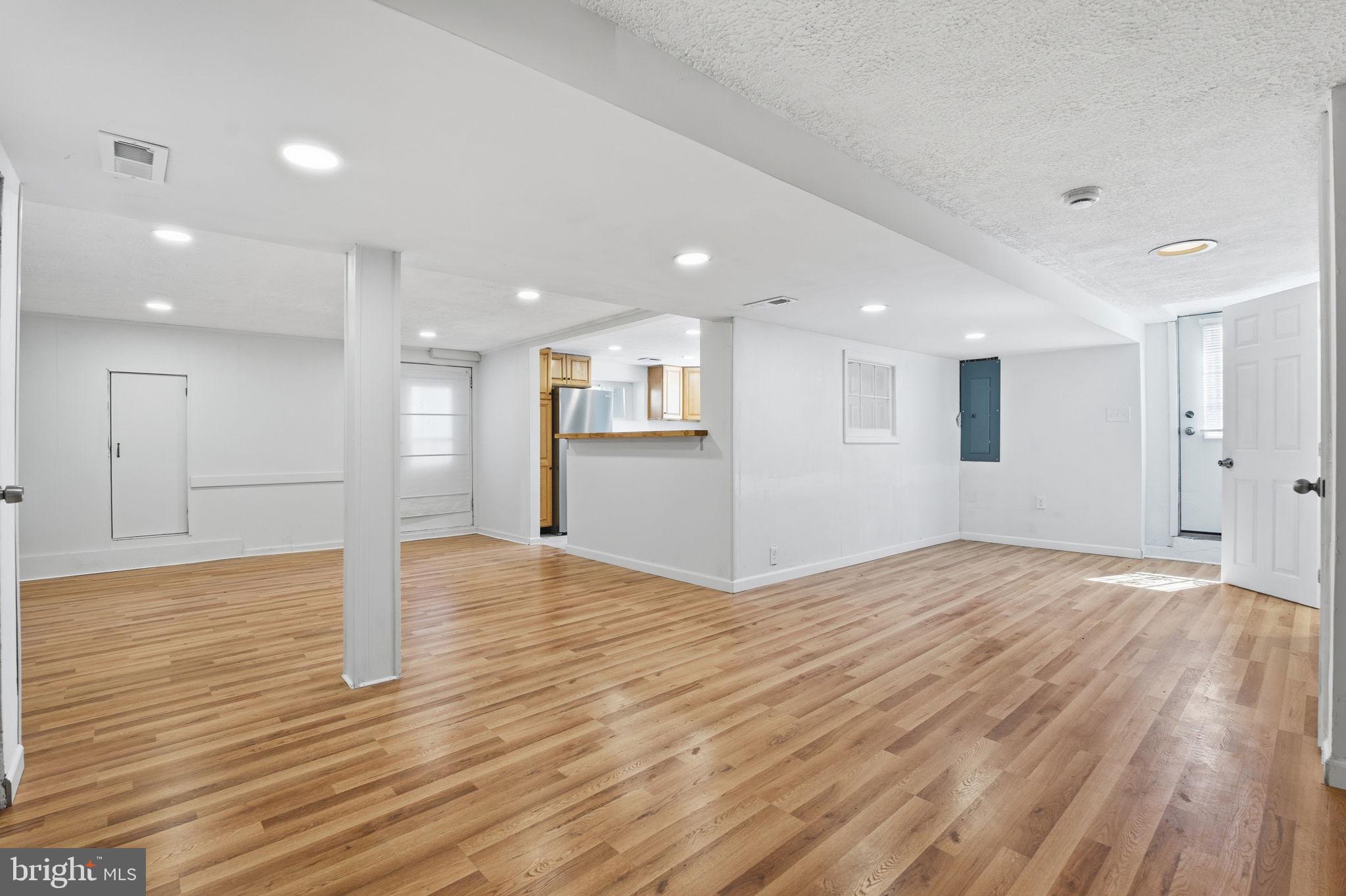 2301 Bayside Drive Baltimore, MD 21221 - Photo 6 of 35 a view of empty room with wooden floor