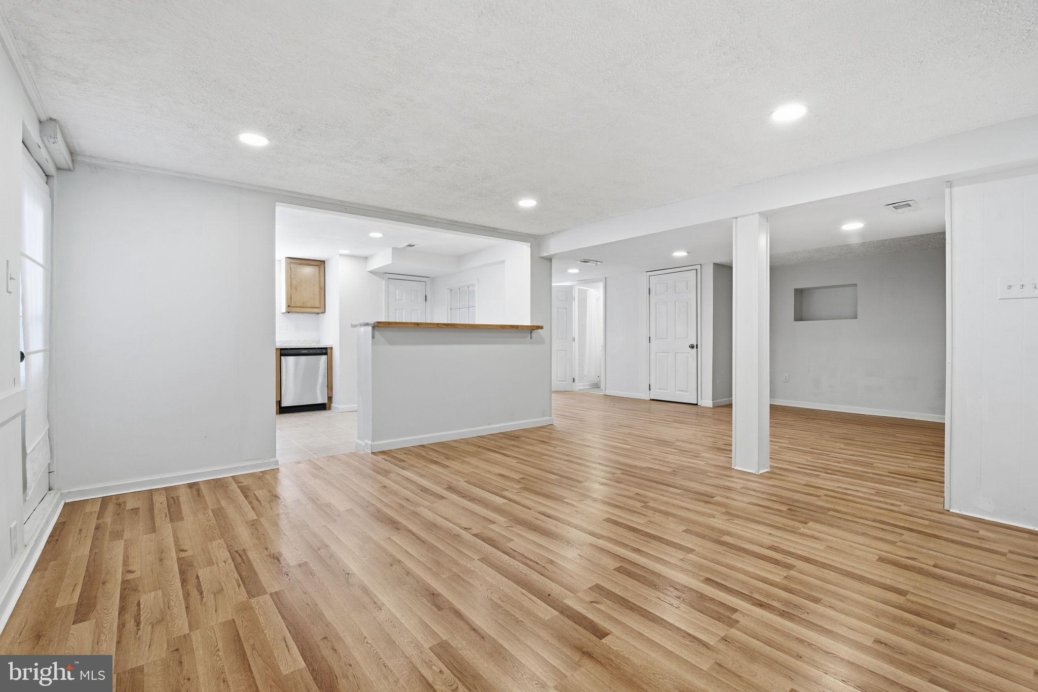 2301 Bayside Drive Baltimore, MD 21221 - Photo 7 of 35 a view of empty room with wooden floor