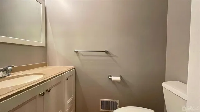 a bathroom with a sink and a toilet