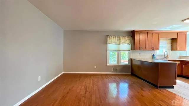 a room with wooden floors and walls