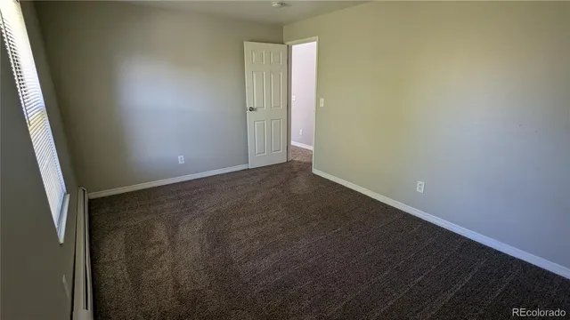 a view of small space with racks on the wall