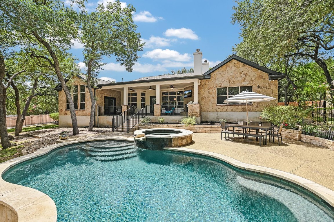 524 Highland Spring Lane Georgetown, TX 78633 - Photo 1 of 39 a view of a house with swimming pool and sitting area