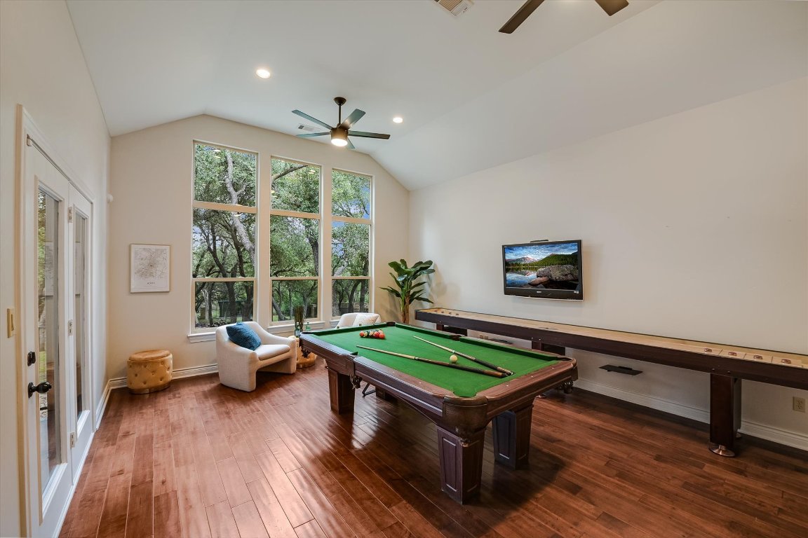 524 Highland Spring Lane Georgetown, TX 78633 - Photo 24 of 39 a living room with furniture pool table and a large window