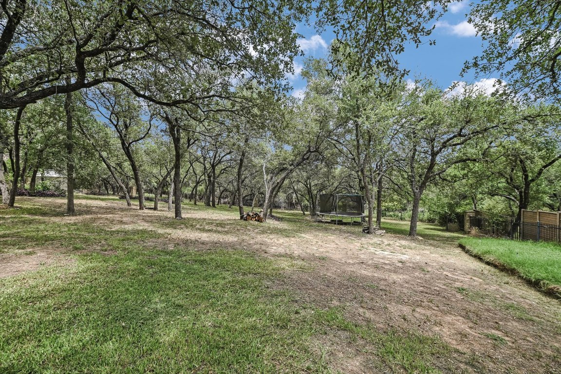524 Highland Spring Lane Georgetown, TX 78633 - Photo 30 of 39 a view of outdoor space with trees