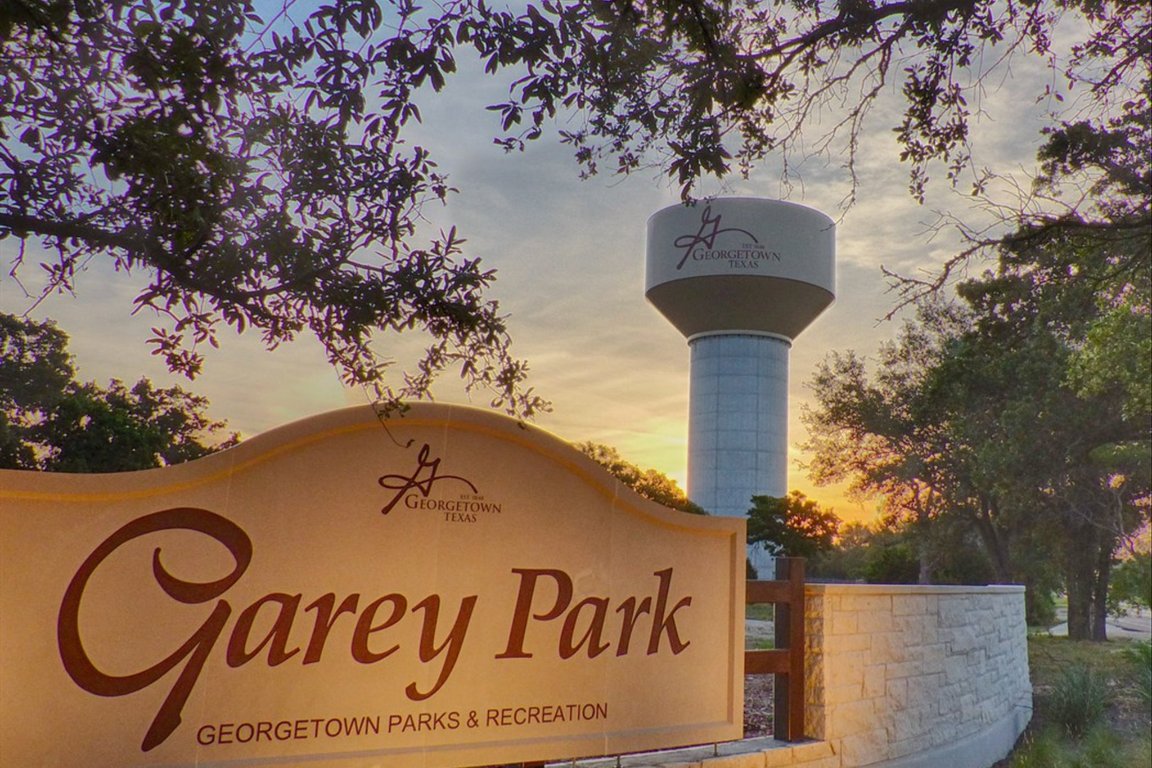 524 Highland Spring Lane Georgetown, TX 78633 - Photo 39 of 39 a sign that is on the side of the tree