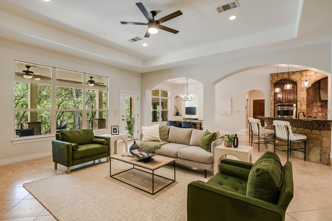 524 Highland Spring Lane Georgetown, TX 78633 - Photo 7 of 39 a living room with furniture and a large window