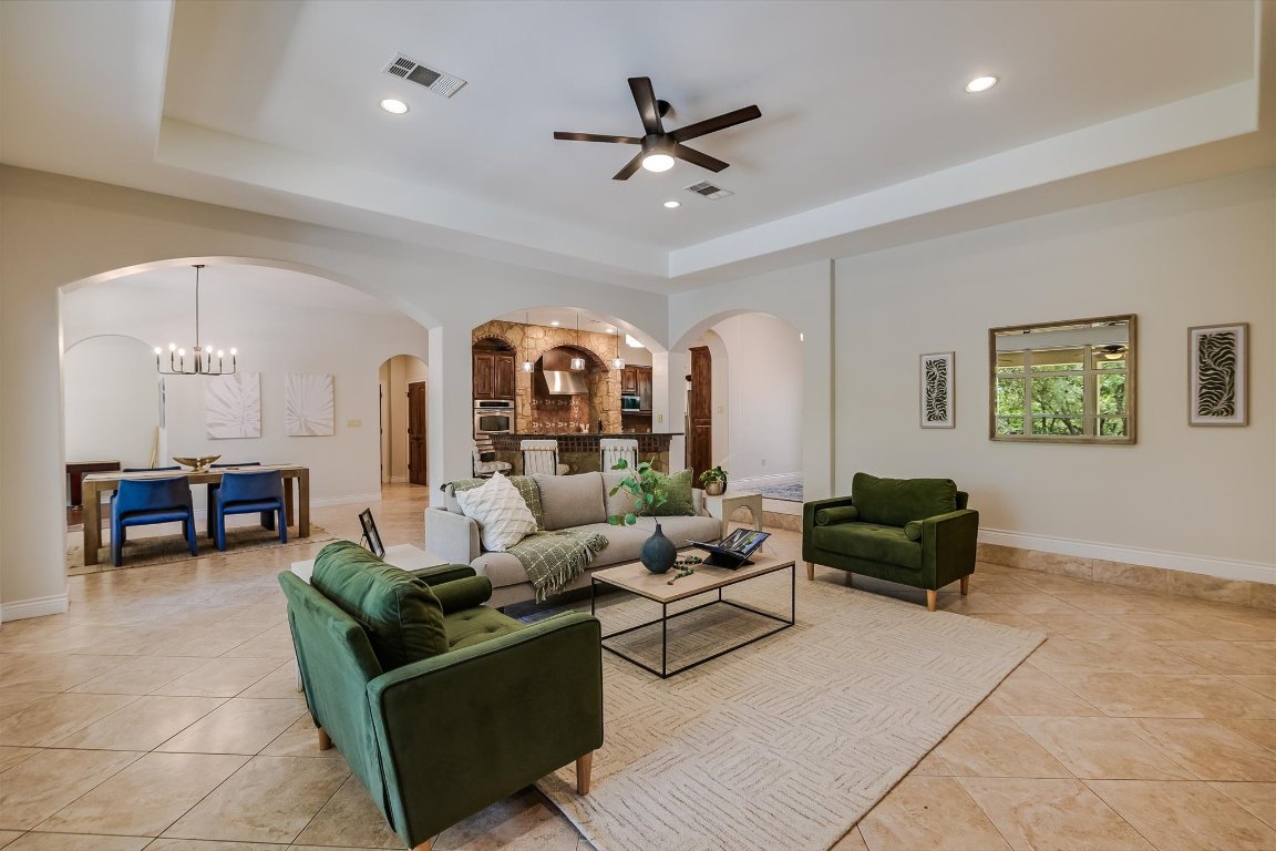 524 Highland Spring Lane Georgetown, TX 78633 - Photo 8 of 39 a living room with furniture and a large window