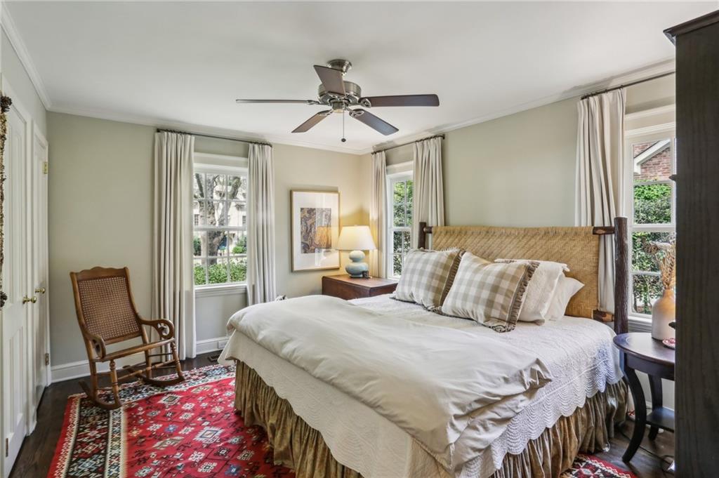 2415 Oldfield Road Northwest Atlanta, GA 30327 - Photo 26 of 27 a bedroom with a bed and a window