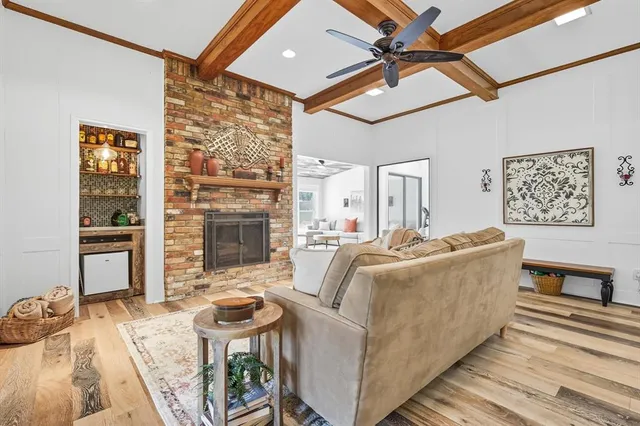 a living room with furniture and a rug