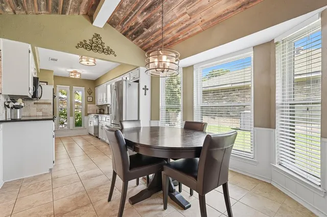 a view of living room with furniture and wooden floor