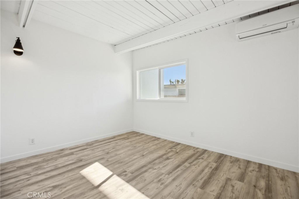 528 Creston Road Paso Robles, CA 93446 - Photo 11 of 46 a view of a room with wooden floor and white walls