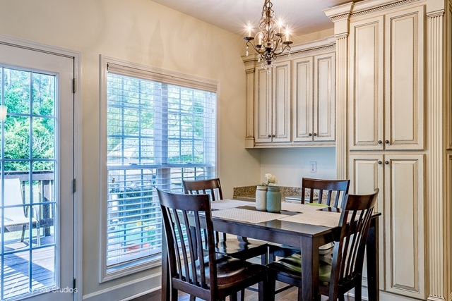 2575 Collier Road Forsyth, GA 31029 - Photo 13 of 25 a view of a dining room with furniture window and outside view
