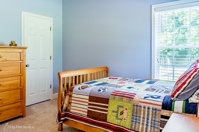 2575 Collier Road Forsyth, GA 31029 - Photo 16 of 25 a bedroom with a bed and a window