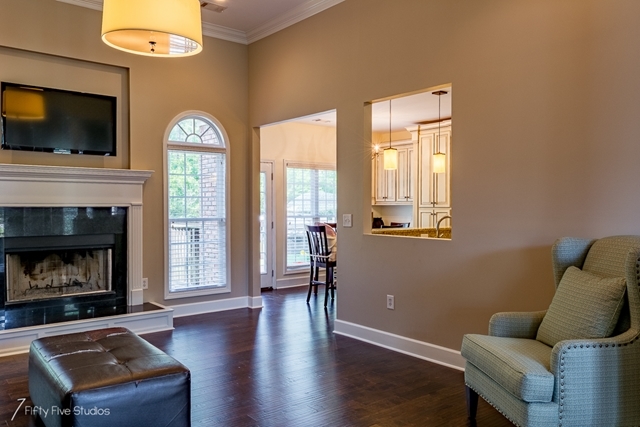 2575 Collier Road Forsyth, GA 31029 - Photo 7 of 25 a living room with furniture and a flat screen tv