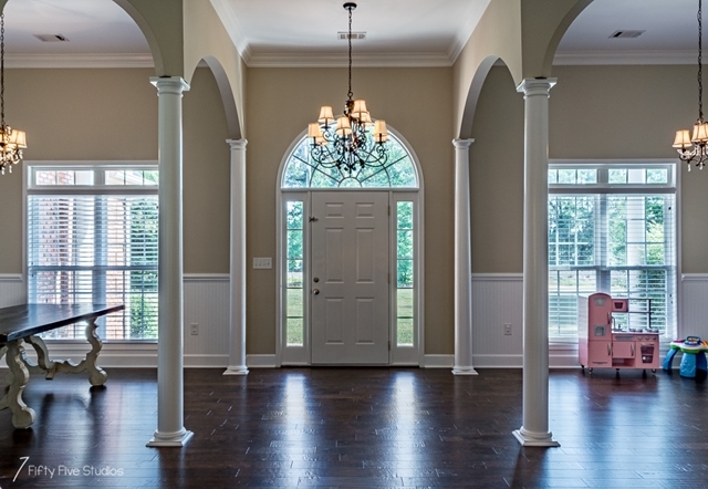 2575 Collier Road Forsyth, GA 31029 - Photo 8 of 25 a view of a room with wooden floor and windows