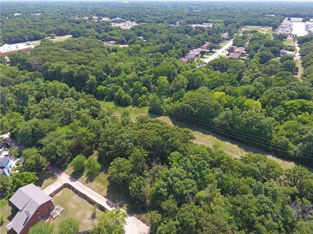11516 Oak Tree Road Balch Springs, TX 75180 - Photo 6 of 7 an aerial view of a house with a yard