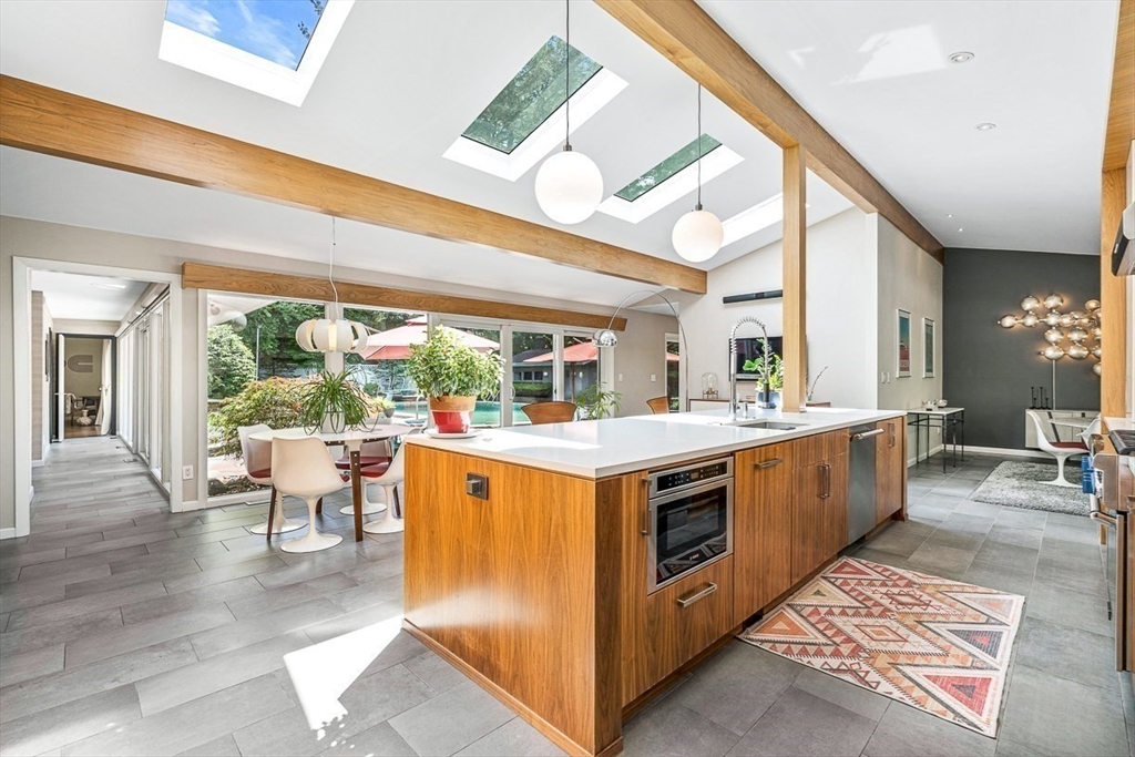 12 Alexandra Road Lynnfield, MA 01940 - Photo 12 of 42 a kitchen that has a lot of cabinets in it