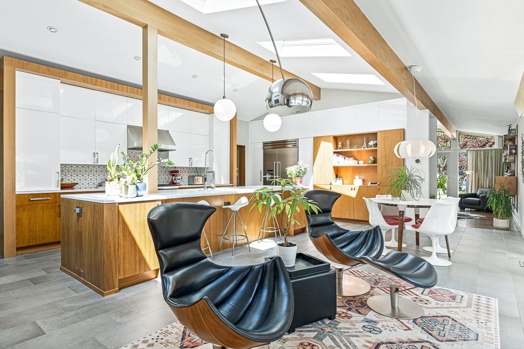12 Alexandra Road Lynnfield, MA 01940 - Photo 13 of 42 a living room with lots of furniture and a large window